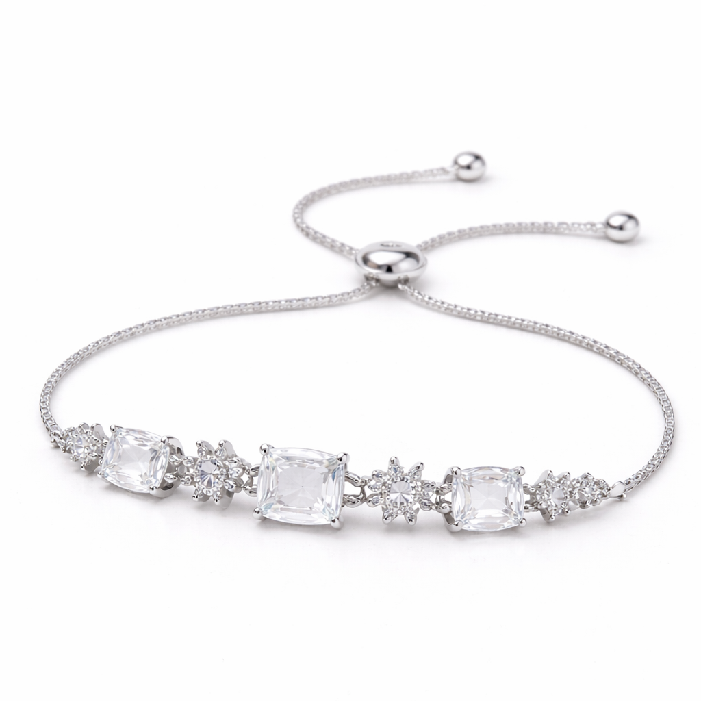 Silver bracelet with clear gemstones on a white background